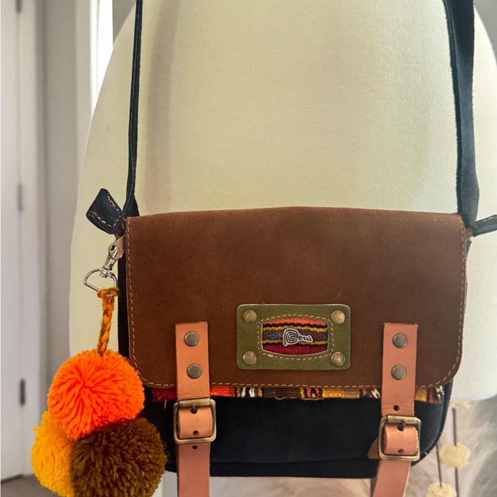 Handmade in Peru Multicolor Crossbody Bag with Pom Poms leather shoulder.